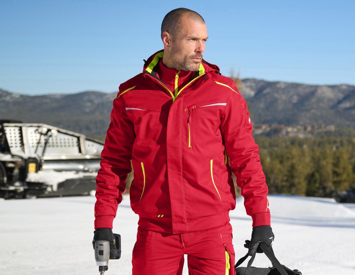 Main action image Winter softshell jacket e.s.motion 2020, men's fiery red/high-vis yellow